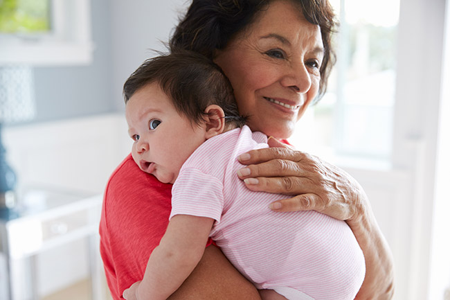 Image of a grandmother and a baby
