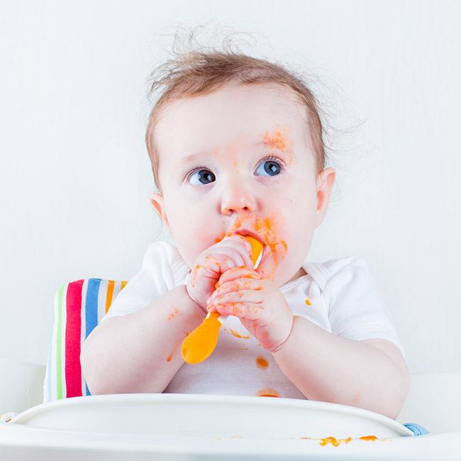messy baby eating