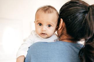 How to Handle a Nursing Strike Image of Baby on Shoulder